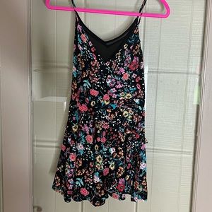 Express. Black multi color floral romper. Size 4
